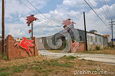 Jacksonville, TX: Vintage Mobil Oil Sign at abandoned bulk oil station in Jacksonville, TX Editorial Stock Photo