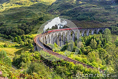 Jacobite steam train on Glenfinnan viaduct in Scotland, United Kingdom Editorial Stock Photo
