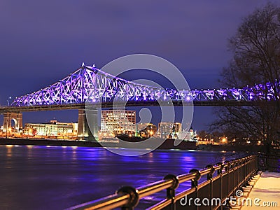 Jacques Cartier Bridge illuminated at night Stock Photo