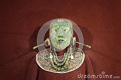 Jade mosaic funeral mask and the jewelry found in the tomb of Mayan king Pakal from Palenque, the National Museum of Anthropology Editorial Stock Photo