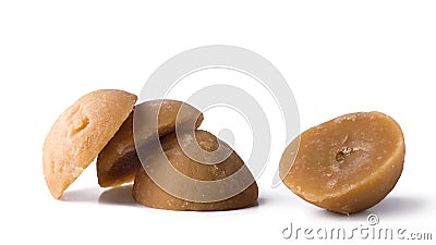 Jaggery, cup shaped unrefined sugar or palm sugar isolated on white Stock Photo