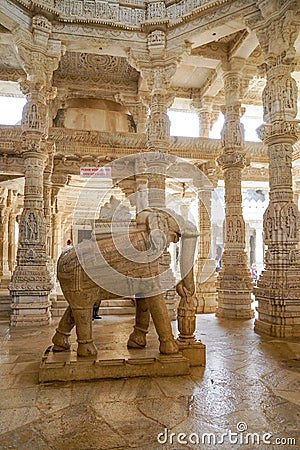 Ranakpur Jain Temple, interior with elephant statues and finely carved marble columns with bas-reliefs, Rajasthan Editorial Stock Photo