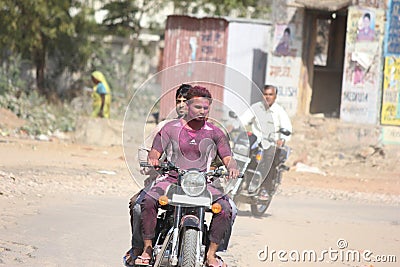 Jaipur, Rajasthan/India- March-20-2019. people celebrating holi and coming back Editorial Stock Photo