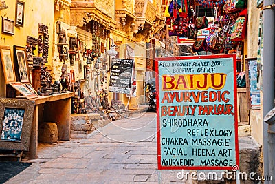 Street market Indian traditional ornaments and ethnic bags shop in Jaisalmer, India Editorial Stock Photo