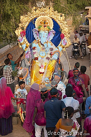 JAISALMER, INDIA - SEPTEMBER 8th: Devotees carying the statue of Lord Ganesha during Ganesha Chaturthi festival Editorial Stock Photo