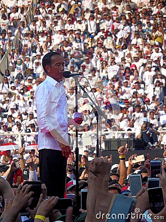 Candidates for President Joko Widodo campaign in front of hundreds of thousands of supporters at GBK Senayan. Editorial Stock Photo