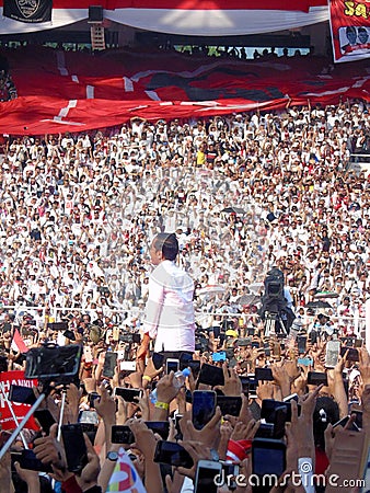 Candidates for President Joko Widodo campaign in front of hundreds of thousands of supporters at GBK Senayan. Editorial Stock Photo