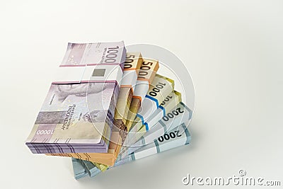 Jakarta, Indonesia, April 15, 2023, various bundles of Indonesian rupiah banknotes in the IDR currency thousands copy space thr Editorial Stock Photo