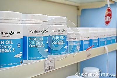 Jakarta, Indonesia, february 16, 2022: Various types of vitamins and supplements, fish oil on the pharmacy shelf. Drugstore and Editorial Stock Photo