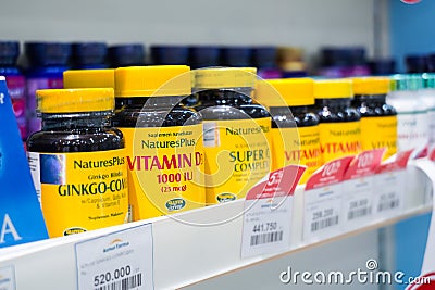 Jakarta, Indonesia, february 16, 2022: Various types of vitamins and supplements, propolis on the pharmacy shelf. Drugstore and Editorial Stock Photo