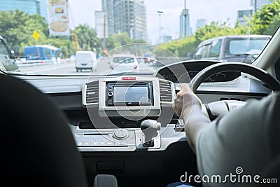 Unknown man driving a car on the highway Editorial Stock Photo