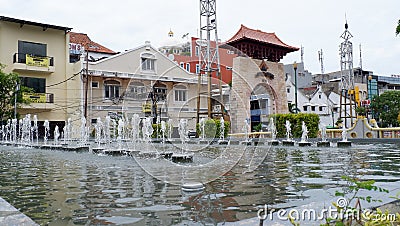 Jakarta, Indonesia - November 1 2020; the view of Jakarta city at Pasar Baru area with pond and cloudy sky, Indonesia Editorial Stock Photo