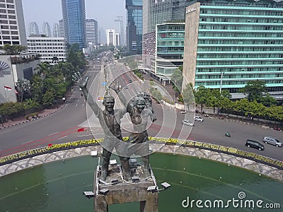 Jakarta, Indonesia - Oct 30, 2019: The Welcome Monument Patung Selamat Datang at Bundaran HI Hotel Indonesia Roundabout on J Editorial Stock Photo