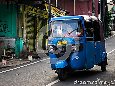 Jakarta June 2021 - Three wheels taxi cab calld as Bajaj Editorial Stock Photo