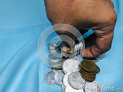 pile of Indonesian currency rupiah coins Stock Photo