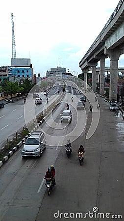Jalan Jenderal Sudirman, one of the main roads in the city of Palembang, is still empty of vehicles in the morning Editorial Stock Photo