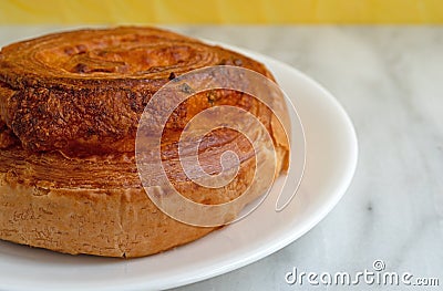 Jalapeno cheese swirl bread on a white plate Stock Photo