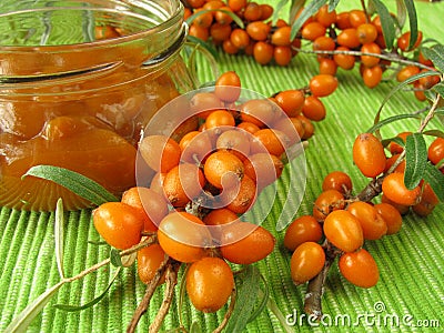 Jam with fruits of sea buckthorn Stock Photo