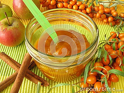 Jam from fruits of sea buckthorn, apples and spice Stock Photo