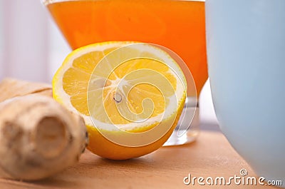 Jam with sea buckthorn juice with ginger and lemon on a wooden background. Conceptual autumn vitamin drink to enhance health and Stock Photo