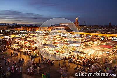 Jamaa el Fna market square at dusk, Marrakesh, Morocco, north Africa. Editorial Stock Photo