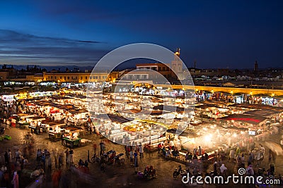 Jamaa el Fna market square at dusk, Marrakesh, Morocco, north Africa. Editorial Stock Photo