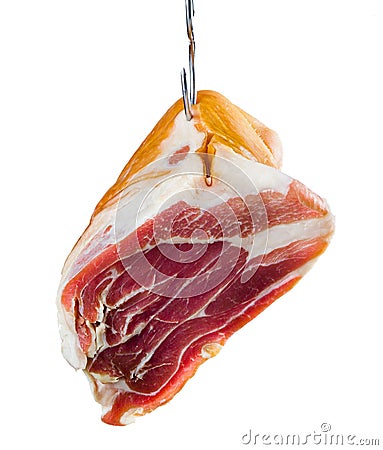 Jamon. Meat is hanging on hook. Isolated Stock Photo