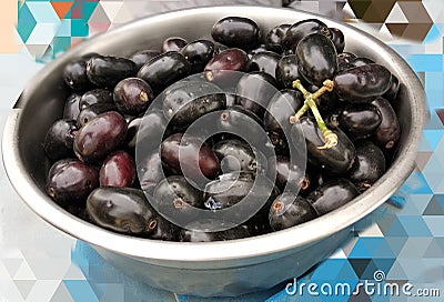 Jamun fruits in a pot Stock Photo