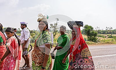 Women with Pilgrims marching, Jamunai, Karnataka, India Editorial Stock Photo