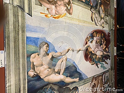 Close-up photo of The Creation of Adam ceiling fresco painting by Michelangelo in the Sistine Chapel Editorial Stock Photo
