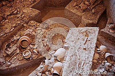 Ancient pottery and prehistory human bones in Ban Chiang Museum, Udon Thani - Thailand Editorial Stock Photo