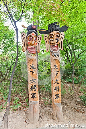 Jangseung totem poles in Namsangol Hanok Village of Seoul Stock Photo