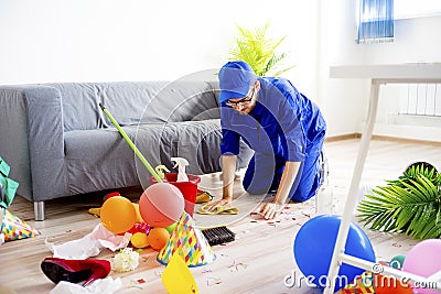 Janitor cleaning a mess Stock Photo