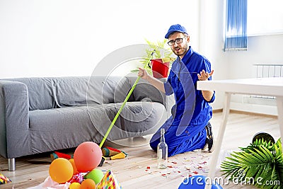 Janitor cleaning a mess Stock Photo