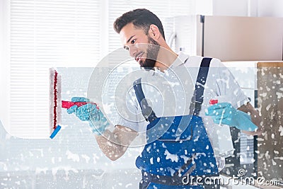 Janitor Cleaning Window With Squeegee Stock Photo