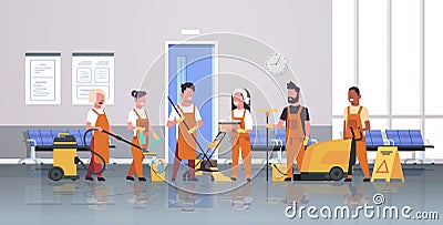 Janitors team cleaning service concept male female cleaners in uniform working together with professional equipment Vector Illustration