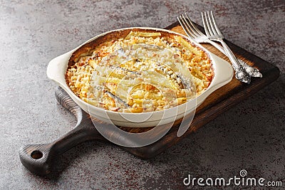 Janssons frestelse or Jansson's temptation is a creamy potato casserole traditionally served at Christmas in Sweden closeup Stock Photo