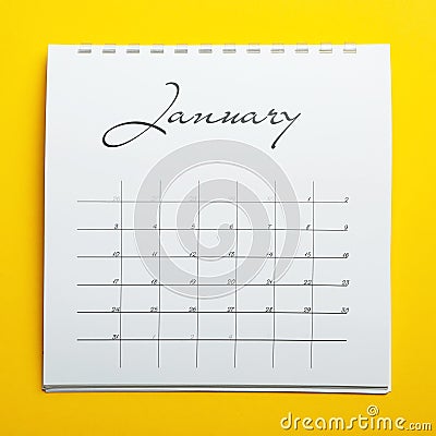 January calendar on yellow background, top view Stock Photo