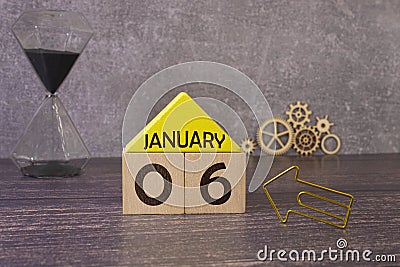 January 6 displayed wooden letter blocks on white background with space for print. Concept for calendar, reminder, date. Stock Photo