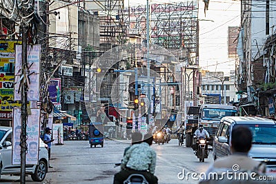 January, 2022, Raipur, chhattisgarh, A view of Raipur city Road people crossing in morning , Lots of electric cable wire above the Editorial Stock Photo