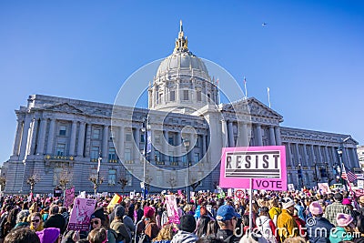 `Resist` sign raised at the Women`s March rally which took place in the Civic Center Plaza Editorial Stock Photo