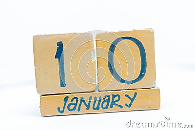 January 10th. Day 10 of month, calendar on wooden background. Winter time, year concept Stock Photo