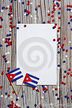 October 10, independence Day of Cuba. the concept of patriotism , freedom and independence. Mini flags with paper ,white red blue Stock Photo