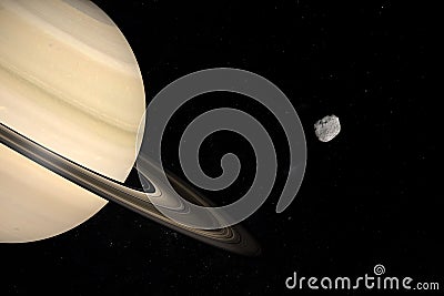 Janus moon orbiting around Saturn planet in the outer space. 3d render Stock Photo