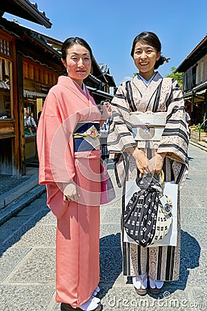 Japan. Kyoto. Higashiyama district. Women wearing traditional kimono Editorial Stock Photo