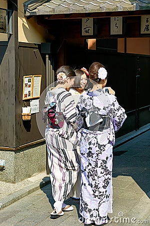 Japan. Kyoto. Young women dressed with traditional kimono Editorial Stock Photo