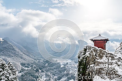 Japan landscape scenic view of red hall perched on rock cliff, yamadera shrine temple, yamagata prefecture, tohoku region, asia Stock Photo