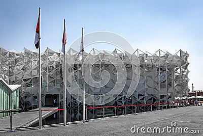 Japan national Pavilion at Expo 2020 Dubai with Japanese and UAE national flags in front. Editorial Stock Photo