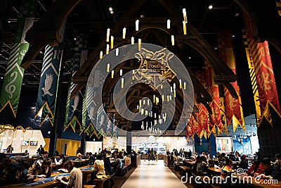 JAPAN - Nov 13, 2023: The Food Hall logo with Gryffindor, Slytherin Hufflepuff, Ravenclaw flag and light decor in Hogwarts Editorial Stock Photo