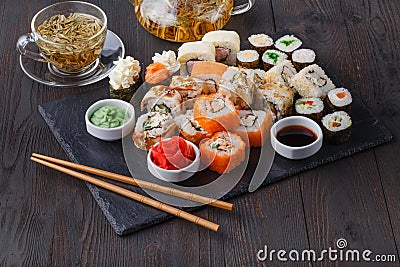 Japan rolls with fish and rice, pile asorted on table Stock Photo